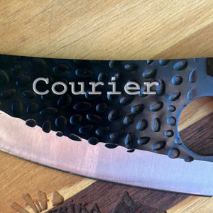 Courier font engraved on the blade